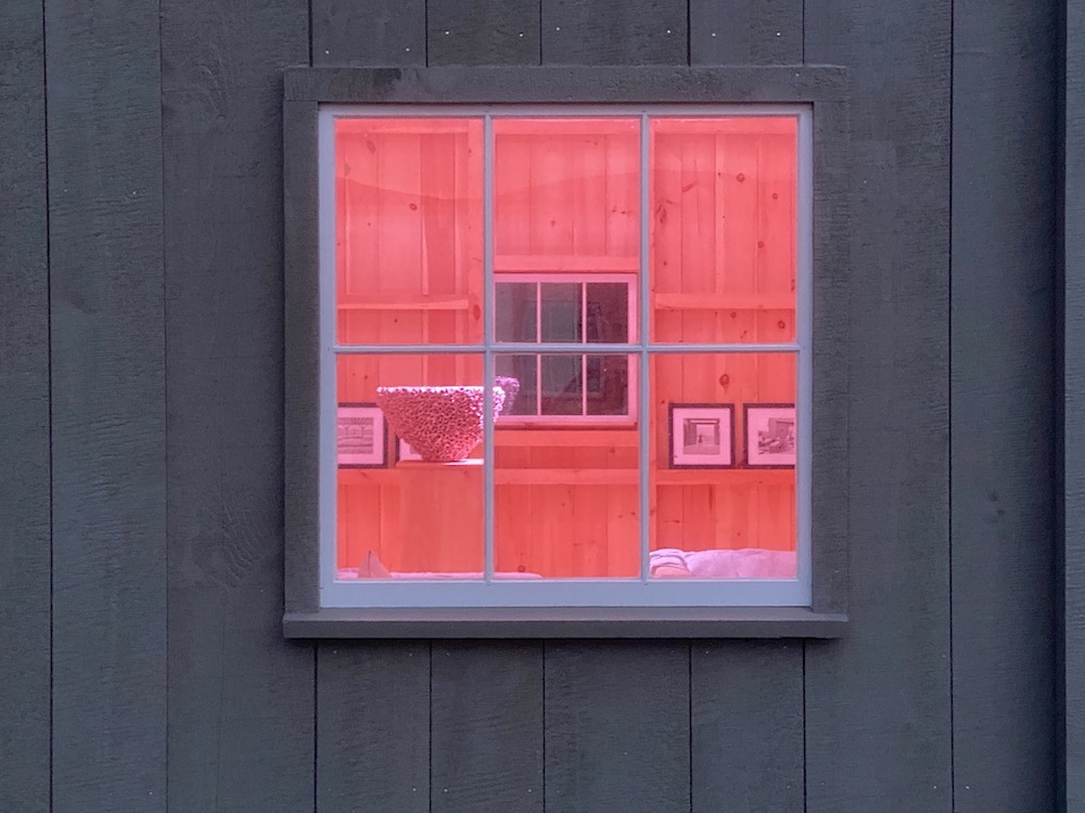 peeking into the pink barn at the swimming hole foundation