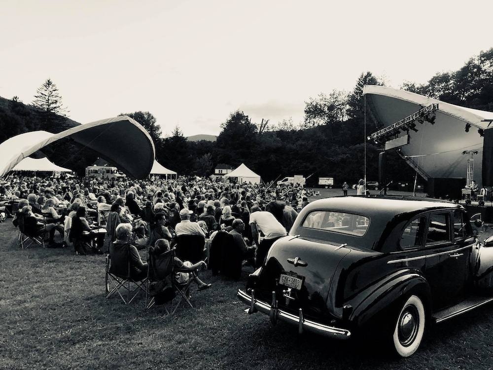 B&W Photo of an old car at the festival