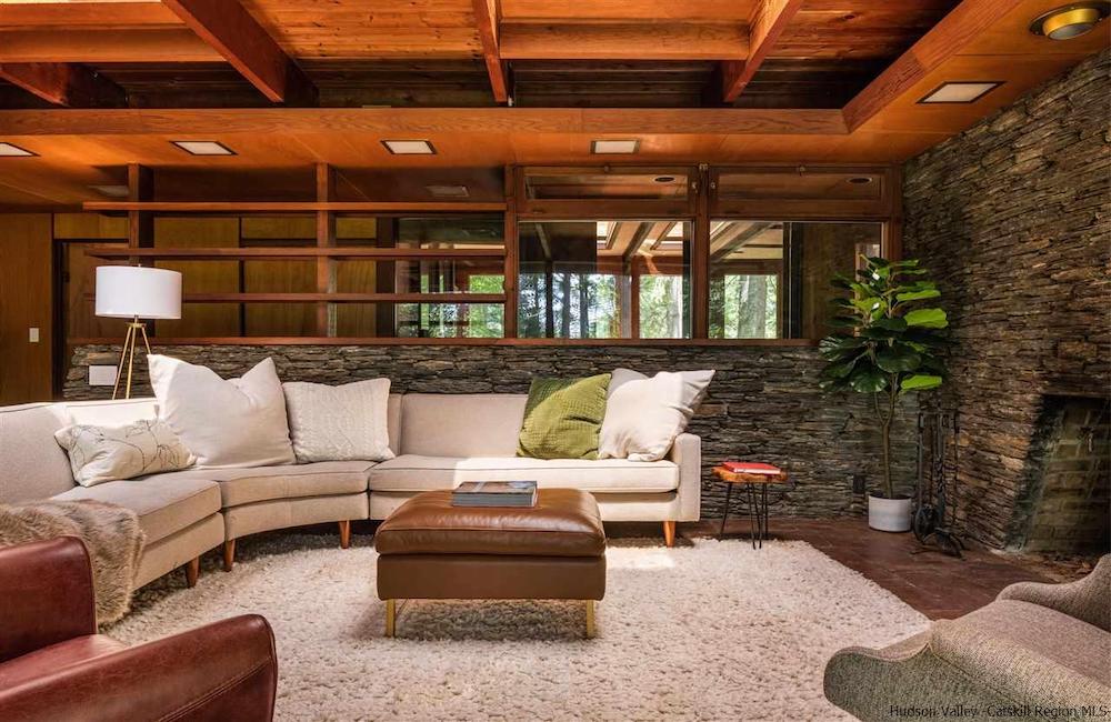 Mid-century modern living room with white couches