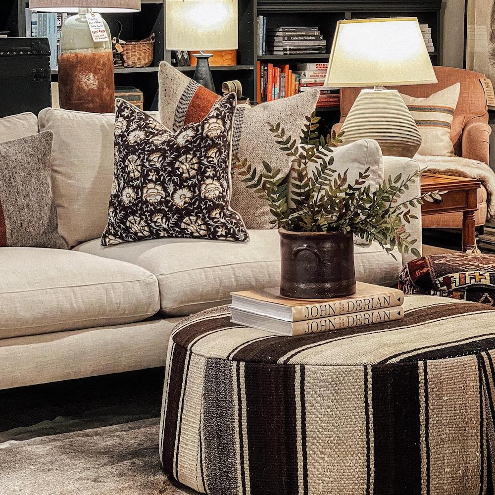living room filled with warm colored furniture