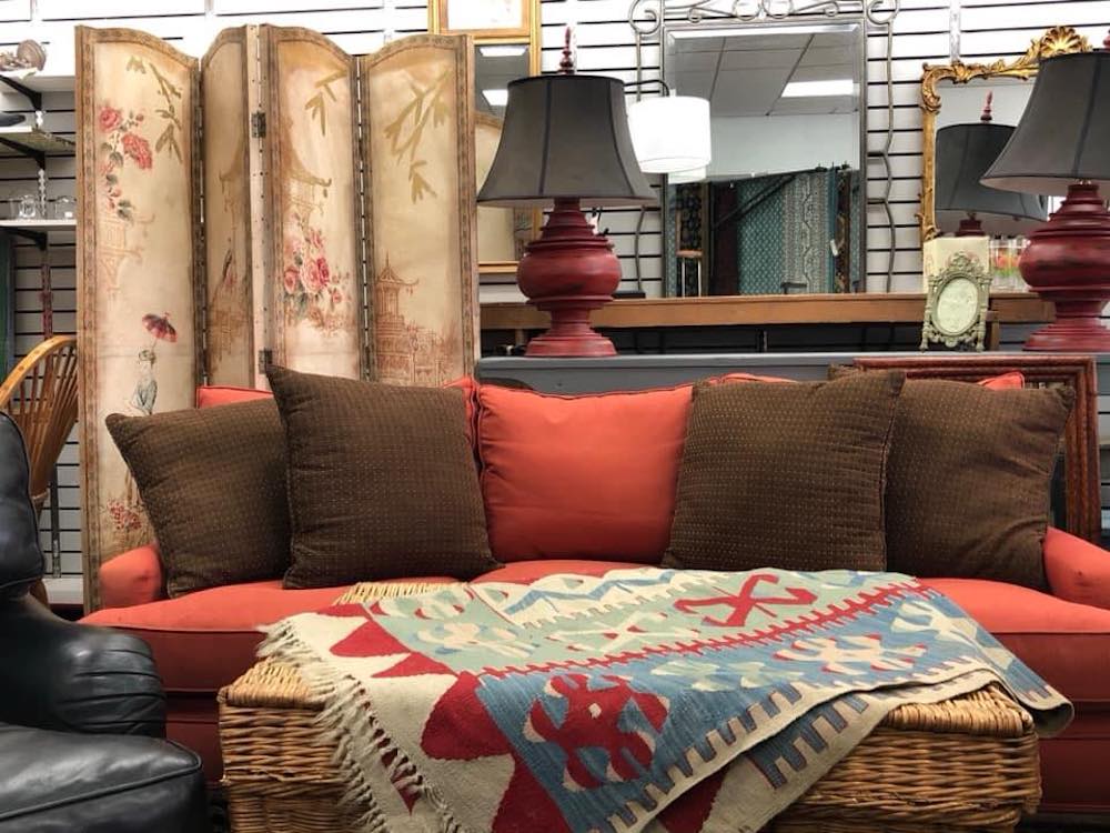 antique couch, rug, and screen 
