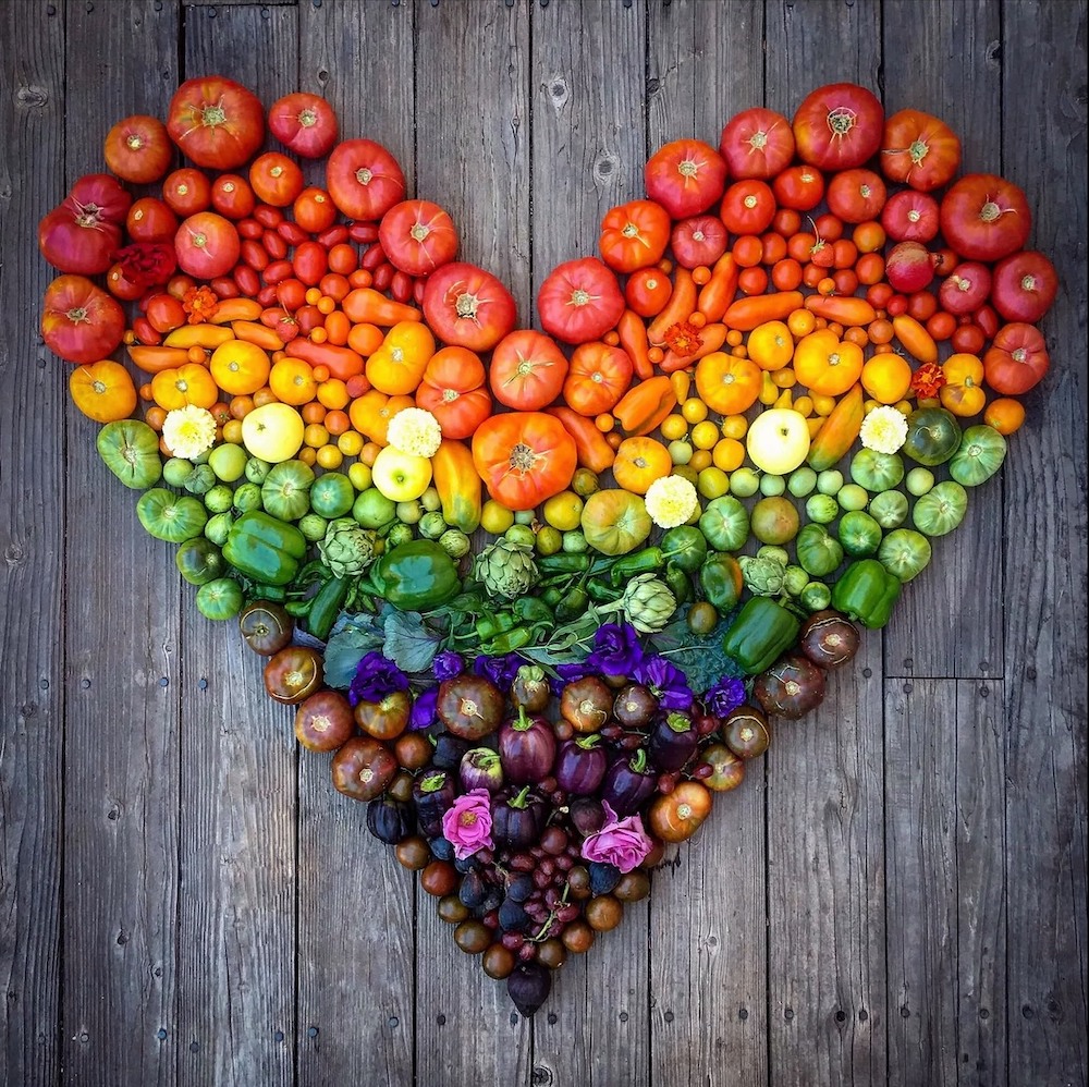 produce in a rainbow array and heart shape
