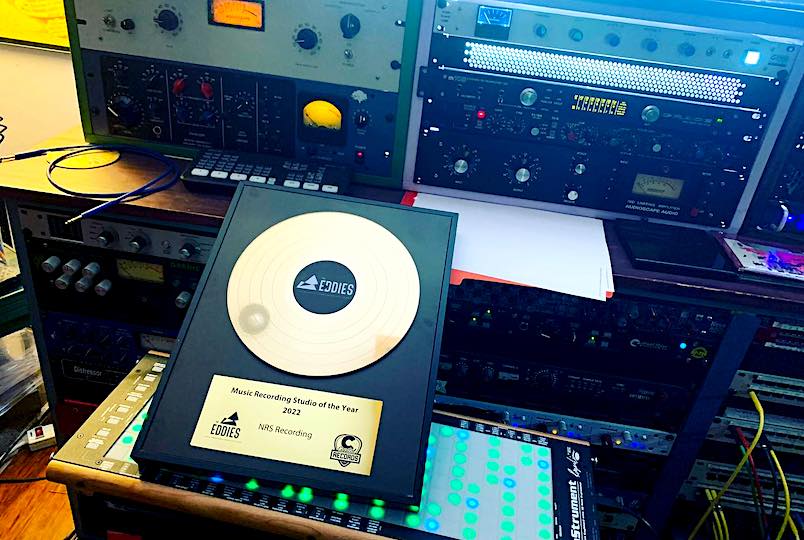 recording studio gear with a plaque award for 2022 Best Studio