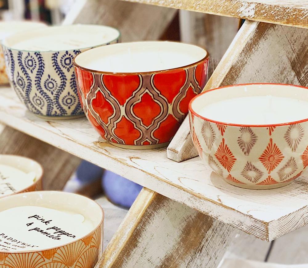 pottery mugs on shelves