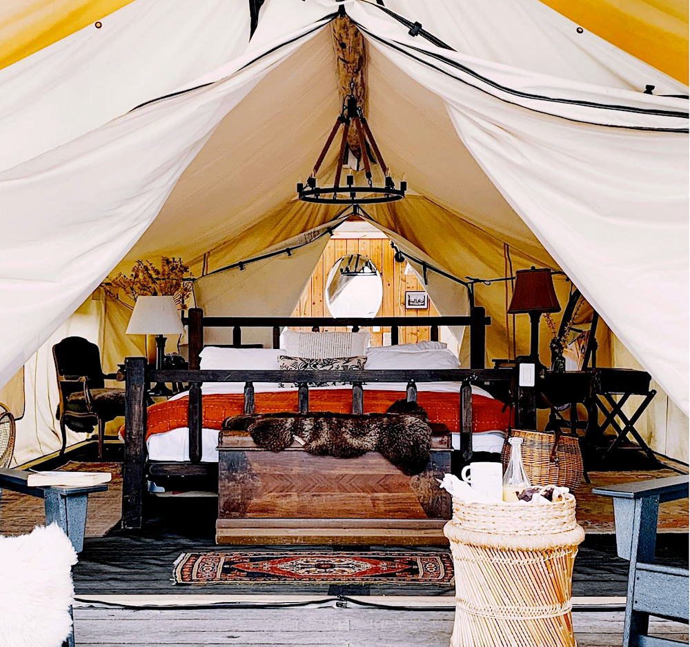 glamping tent with living room items to make it feel like home