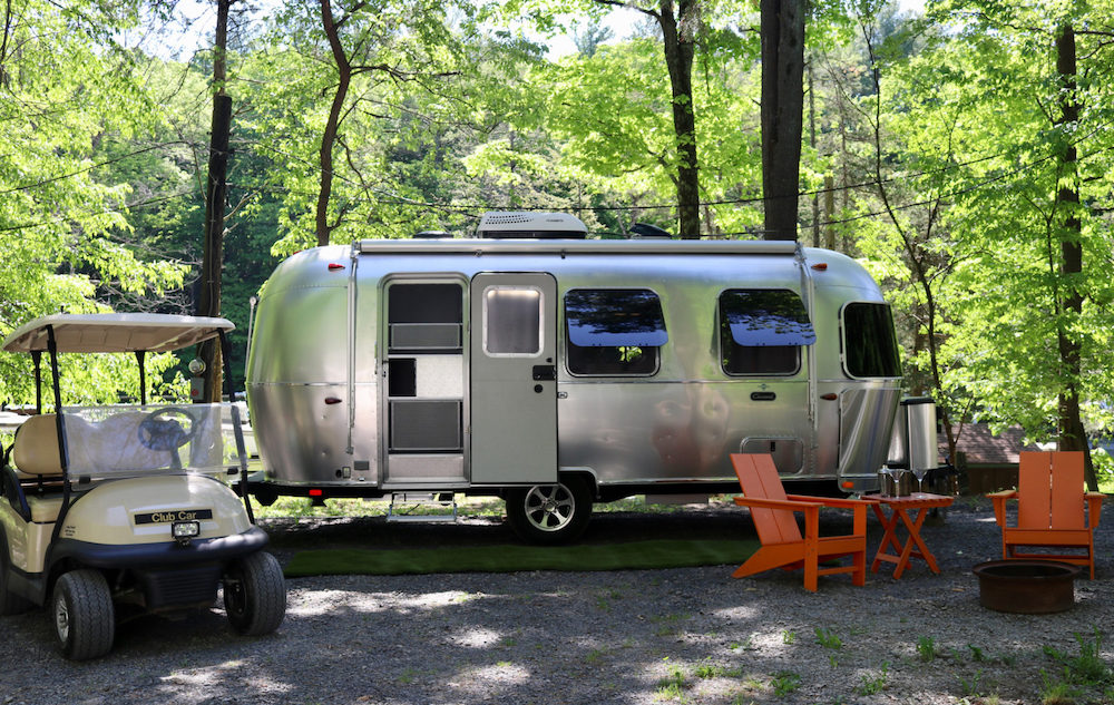 airstream camper in the woods