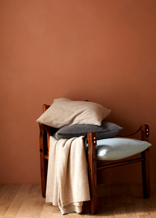 pillows and throw on chair photo-by-Kate-sears