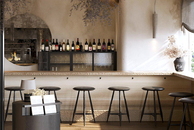 inside a bar with stools and wine bottles
