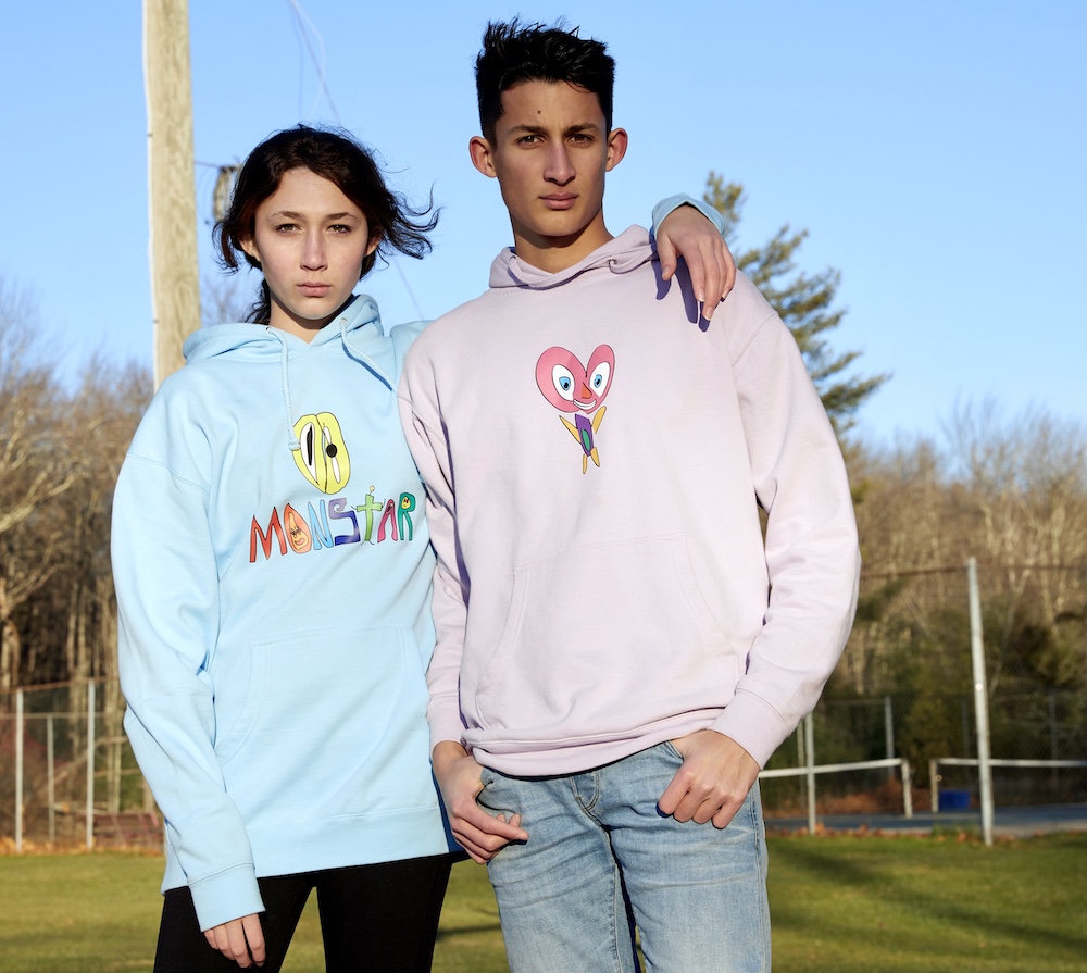 brother and sister in MonStar hoodies