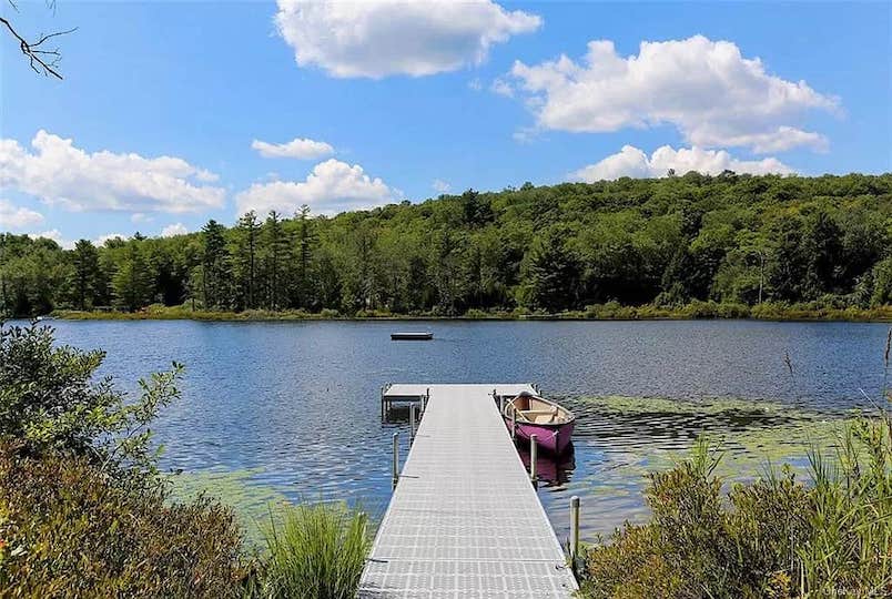 boat dock with canoe and view