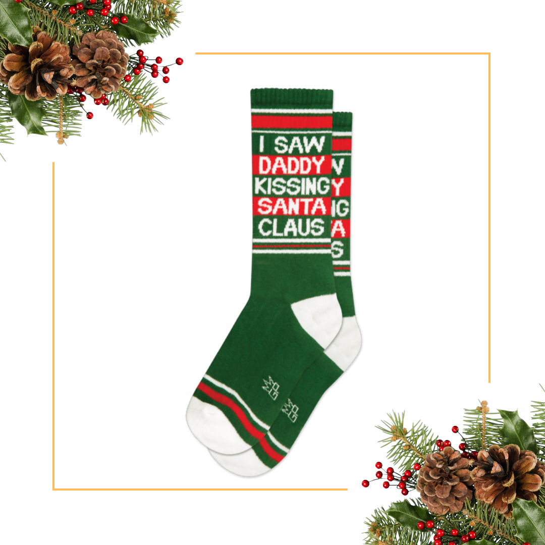 Daddy kissing santa socks at woodsock