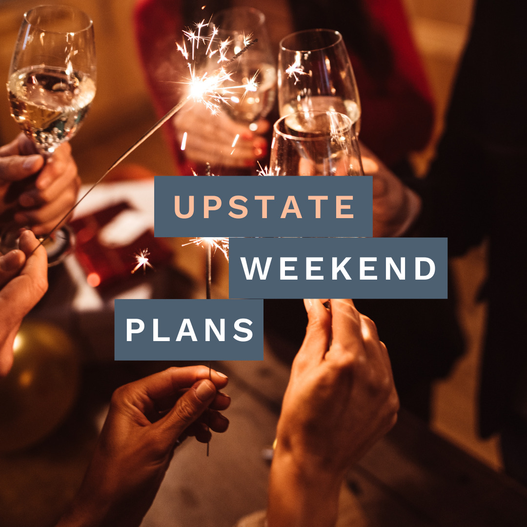 hands toasting drinks and holding sparklers with the "Upstate Weekend Plans" text written across the photo