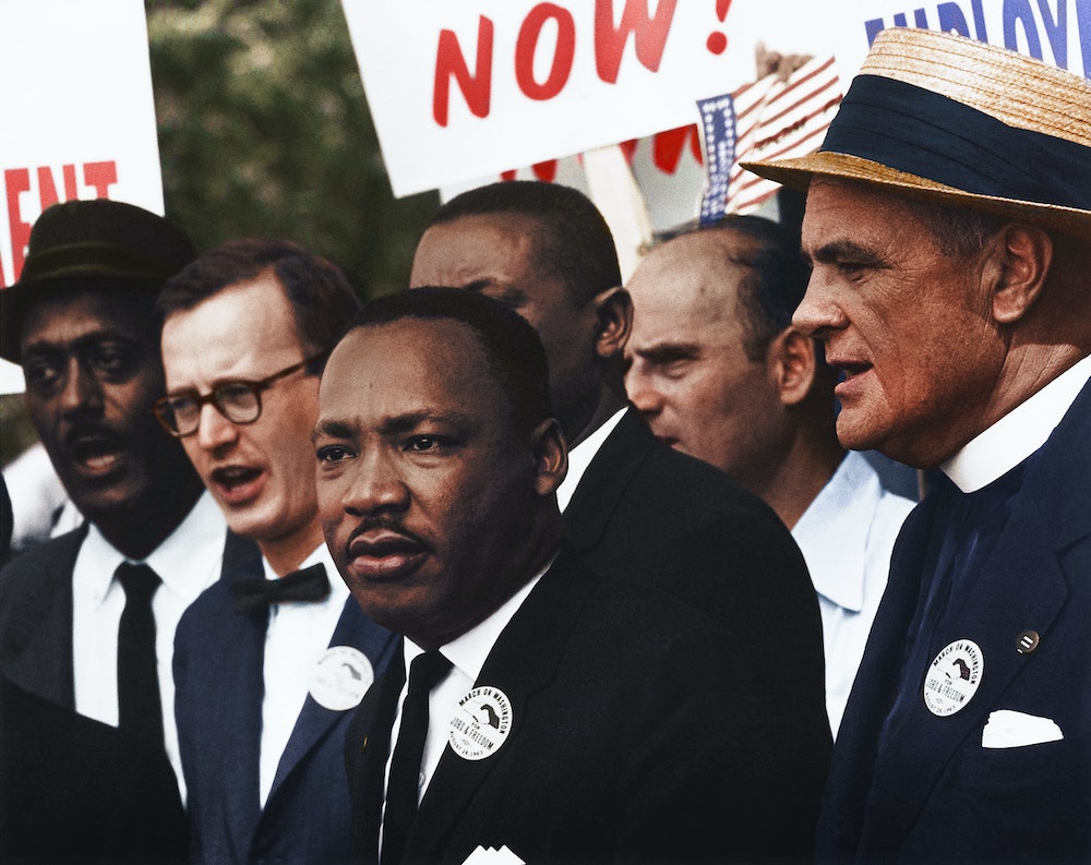 A photo by Unseen Histories of Reverend Martin Luther King at a march. 