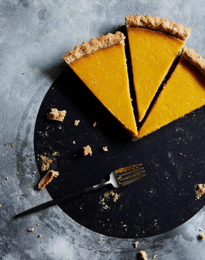 pumpkin tart on a black plate styled by Food Stylist Liza Jernow in Kerhonkson, NY