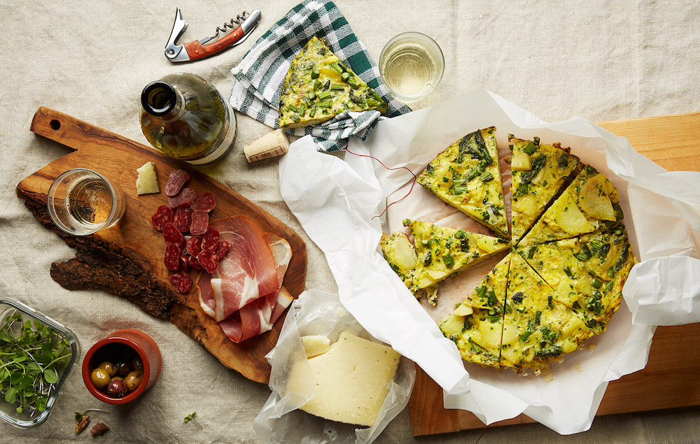 Mix of food dishes (egg tart, cheese, cured meats etc) styled by Food Stylist Liza Jernow in Kerhonkson, NY