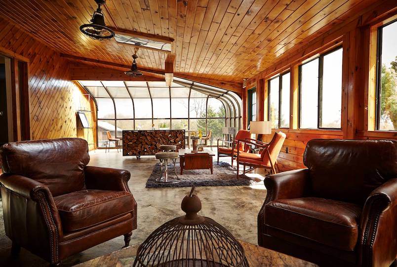 Furniture and wood design in a living room or lounge space at The Arnold House in Livingston Manor NY