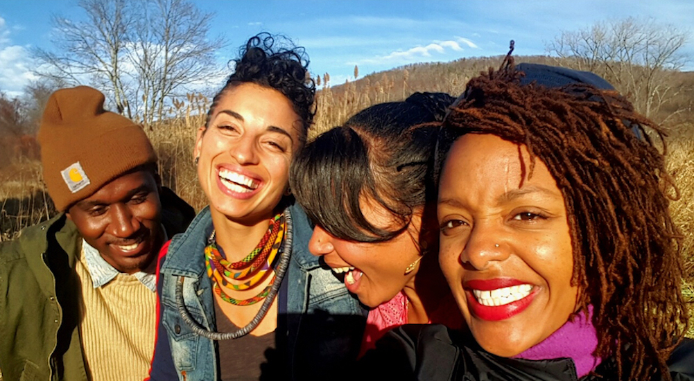 Farmers together laughing into the sunset at Wildseed Farm in Millerton NY