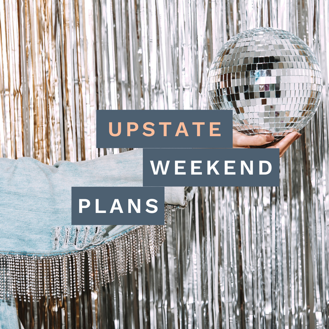 Arm holding up a mirror ball with fringe hanging off the coat and in the background with the "Upstate Weekend Plans" text written across the photo for the Hudson Valley, NY.