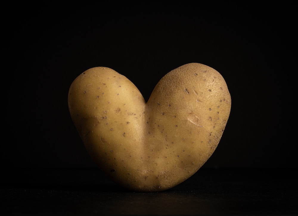 heart-shaped potato for Community Building Through Volunteers blog by Jenny Wonderling and Inside+Out Upstate NY in the Hudson Valley