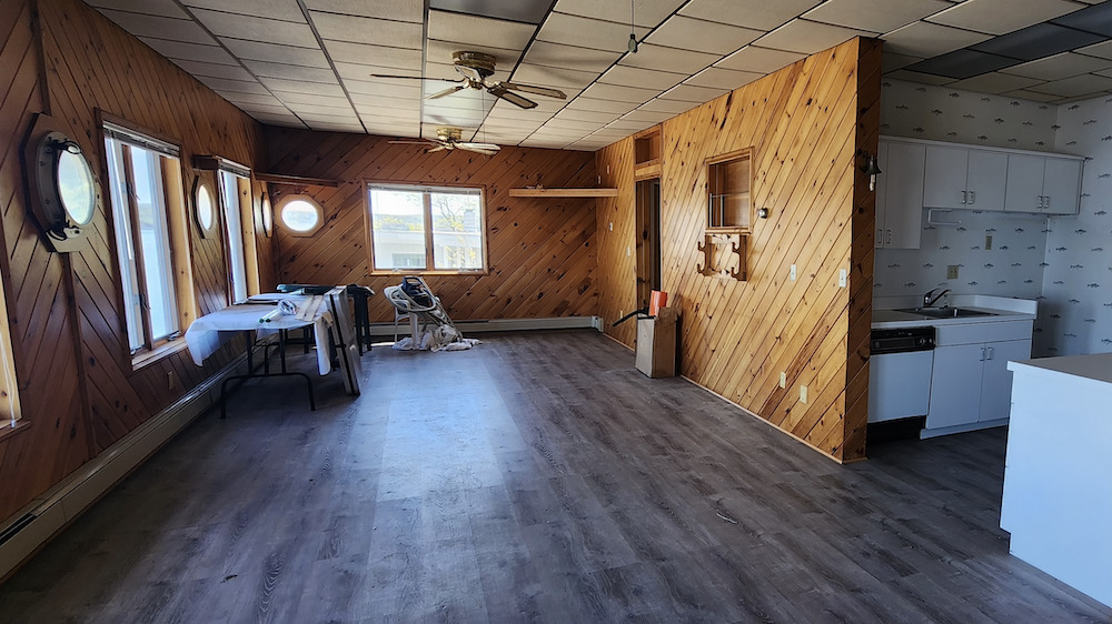 inside dining and kitchen area L. Morse & Associates listing at 105 River Road, Port Ewen NY