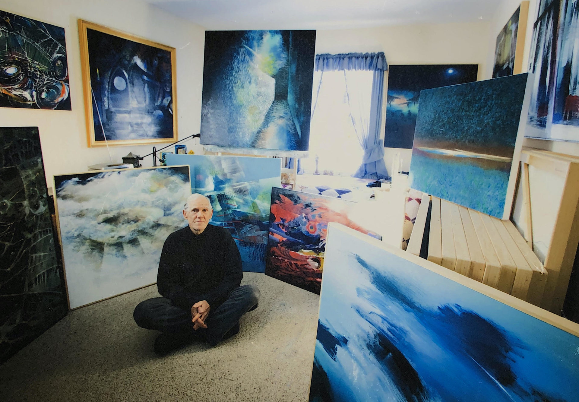 Michael Esposito in the studio with his artwork