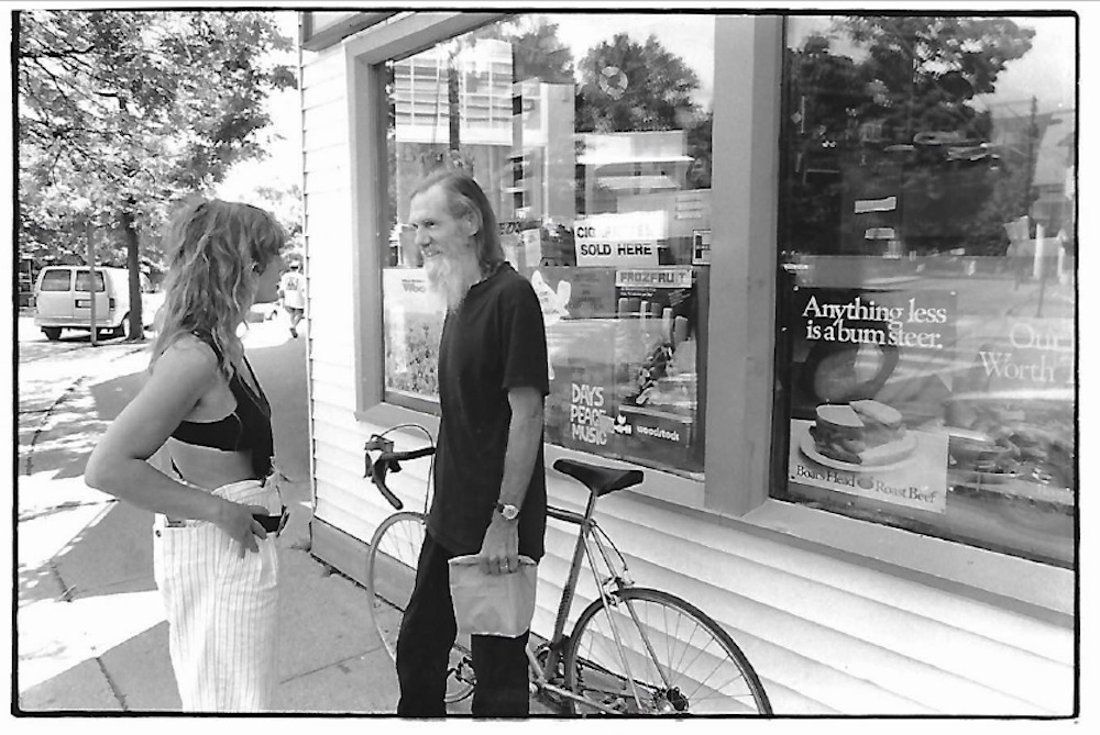 Michael Esposito chatting to woman in Woodstock NY