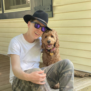 Artist Nicole Becher with dog